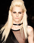 Model Andrej Pejic presents a creation by French designer Jean Paul Gaultier as part of his Haute Couture Fall/Winter 2012-2013 fashion show in Paris