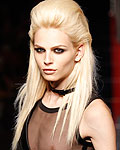 Model Andrej Pejic presents a creation by French designer Jean Paul Gaultier as part of his Haute Couture Fall/Winter 2012-2013 fashion show in Paris