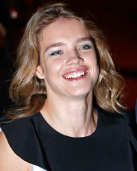 Antoine Arnault (R), member of LVMH group's board of directors and head of communications for Louis Vuitton, and girlfriend, Russian model Natalia Vodianova arrive at the Givenchy Spring/Summer 2014 women's ready-to-wear fashion show during Paris Fashion Week