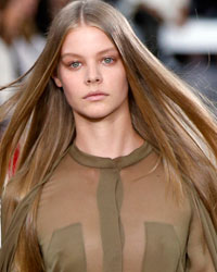 A model presents a creation by British-born designer Clare Waight Keller from her Spring/Summer 2014 women's ready-to-wear collection for French fashion house Chloe during Paris Fashion Week