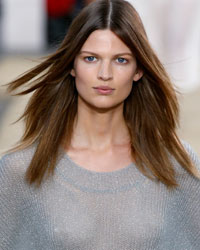 A model presents a creation by British-born designer Clare Waight Keller from her Spring/Summer 2014 women's ready-to-wear collection for French fashion house Chloe during Paris Fashion Week