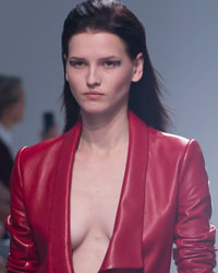 A model presents a creation by designer Anthony Vaccarello as part of his Spring Summer 2014 women's ready-to-wear fashion show during Paris fashion week