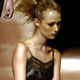 A model wears a creation as part of Maria Bonita's 2005 Autumn/Winter collection at Rio Fashion week in Rio de Janeiro.