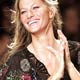 Gisele Bundchen presents a creation from the 2006 spring/summer collection of Colcci at Fashion Rio Show in Rio de Janeiro.