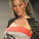 Brazilian model Bundchen presents creation from Colcci's 2006 spring/summer collection during Fashion Rio Show.