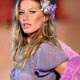 Gisele Bundchen wears a creation as part Cocci's 2005 Autumn/Winter collection at Rio Fashion week in Rio de Janeiro.