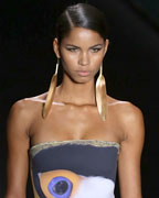 A model presents a creation from the Agua de Coco 2013-2014 summer collection during Sao Paulo Fashion Week