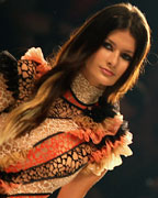 A model presents a creation from Amapo's 2013-2014 summer collection during Sao Paulo Fashion Week