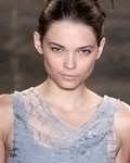 A model presents a creation from the Uma Raquel Davidowicz collection during Sao Paulo Fashion Week Summer 2012-2013 in Sao Paulo