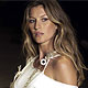 Gisele Bundchen displays a creation from the 2010 Colcci Spring/Summer collection during Sao Paulo Fashion Week