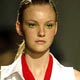 A model wears a creation as part of Reinaldo Lourenco`s 2005 Spring/Summer collection, during Sao Paulo Fashion Week.