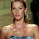 Brazilian model Gisele Bundchen displays a creation from the Colcci Spring/Summer collection during Sao Paulo Fashion Week