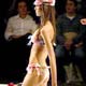 Models display swimsuits as part of Agua Doce`s 2005 Spring/Summer collection, at Sao Paulo Fashion Week