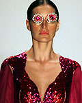 A model presents a creation of FH by Fause Haten Fall-Winter 2013 collection at Sao Paulo Fashion Week