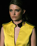 A model presents a creation for Ellus Fall-Winter 2013 collection at Sao Paulo Fashion Week