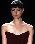 A model presents a creation of the Tufi Duek Fall-Winter 2013 collection at Sao Paulo Fashion Week