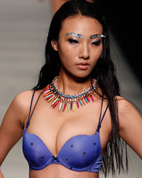 A model presents a creation at the Aquatic Wonders by Shanghai Mode Lingerie show during the 2014 Spring-Summer Shanghai Fashion Week.