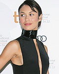 Olga Kurylenko poses at the gala presentation for the film 'Seven Psychopaths' at the 37th Toronto International Film Festival