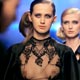 Models present creations by designer Yulia Aysina during a fashion show in Kiev