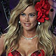 Doutzen Kroes presents a creation during the Victoria's Secret Fashion Show in New York