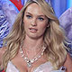 Candice Swanepoel presents a creation during the Victoria's Secret Fashion Show in New York