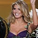 Marisa Miller, Heidi Klum and Doutzen Kroes wave after presenting creations during the 2009 Victoria`s Secret Fashion Show