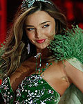 Miranda Kerr presents a creation during the Victoria's Secret Fashion Show in New York