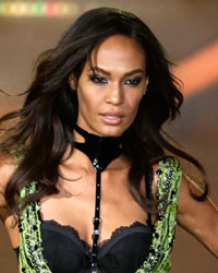 Model Joan Smalls presents a creation during the annual Victoria's Secret Fashion Show in New York