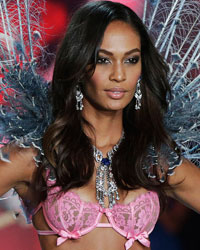 Model Joan Smalls presents a creation during the annual Victoria's Secret Fashion Show in New York