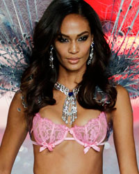 Model Joan Smalls presents a creation during the annual Victoria's Secret Fashion Show in New York