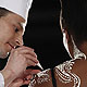 A model receives the last touch-ups before presenting a creation at the first Salon du Chocolat in Zurich