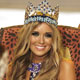 Ksenya Sukhinova of Russia watches as Zulu traditional dancers perform after she was crowned Miss World 2008