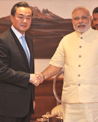 Wang Yi  and Narendra Modi