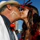 Carnival revellers kiss during parade in Ipanema neighborhood in Rio de Janeiro