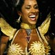 Drummer Muse Gracyanne Barbosa of the Salgueiro samba school parades during the second night of competition between the premier league of schools in Rio de Janeiro