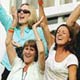 The families of the England team celebrate regaining the Ashes after the final day of the fifth test of the Ashes series in London.