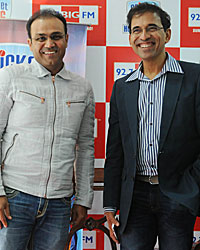 Virender Sehwag and Harsha Bhogle