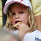 Romeo Beckham waits in the stands in Nuremberg