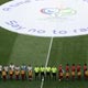 Germany and Costa Rica players line up with match officials before their Group A World Cup 2006 soccer match in Munich