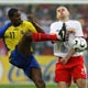 Delgado battles for ball with Jop during Group A World Cup 2006