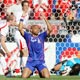 Henry reacts to a decision by referee Ivanov of Russia