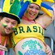 Brazil fans pose inside the stadium before the Group F World Cup 2006 soccer match between Brazil and Croatia in Berlin