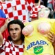 Croatia fan holds a doll before the Group F World Cup 2006 soccer match between Brazil and Croatia in Berlin