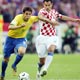 Kaka battles for the ball with Babic during their Group F World Cup 2006 soccer match in Berlin