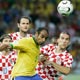 Emerson fights for ball with Dado Prso during Group F World Cup 2006 soccer match in Berlin