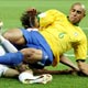 Roberto Carlos battles for the ball with Srna during their Group F World Cup 2006 soccer match in Berlin