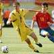 Yesersky battles for the ball with Cesc Fabregas during their Group H World Cup 2006 soccer match in Leipzig