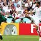 Nawaf Al Temyat battles for the ball with Yassine Chikhaoui during Group H World Cup 2006 soccer match