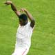 Karim Essediri runs towards team mate Radhi Jaidi as Jaidi celebrates scoring second goal against Saudi Arabia