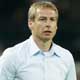 Germany coach Juergen Klinsmann and Poland coach Pawel Janas watch Group A World Cup 2006 soccer match in Dortmund